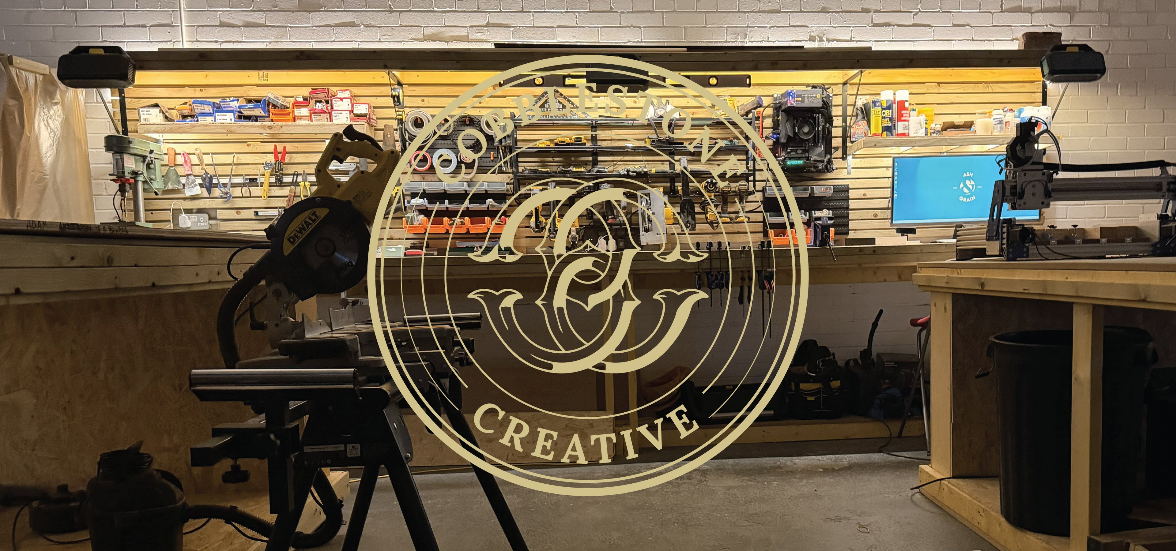 Inside the Cobblestone Creative workshop in Edinburgh — lasers, CNC router, and woodworking equipment in a 1,400 square foot space
